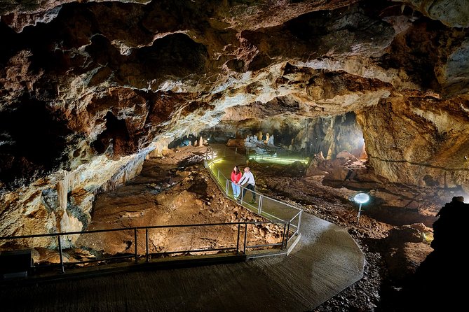 1-Hour Guided Lipa Cave Adventure in Montenegro - Walking through the main corridor and cave halls