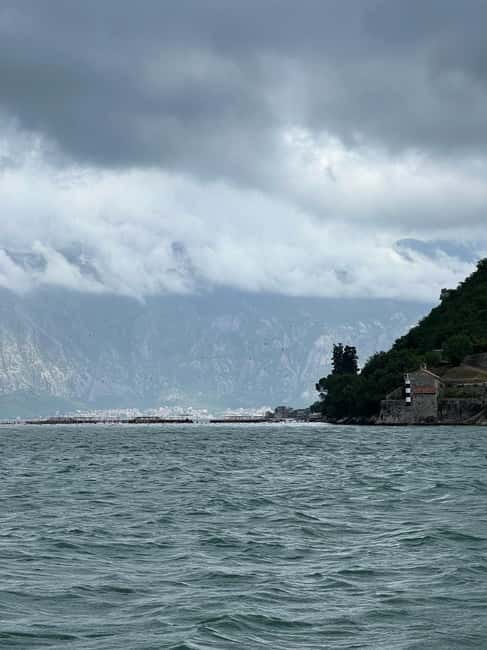 Azure Paradise: Blue Cave and Kotor Bay Boat Tour - The former submarine tunnel: a quick look at military history