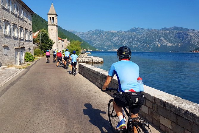 Bike tour - Kotor Bay circle and visit Our Lady of the Rock - Tre Sorelle Palace and the first photo stop