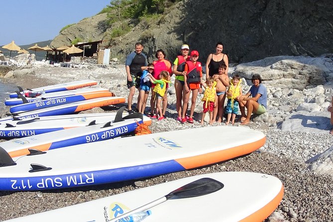Budva Bay: Kayak & SUP Tour to Coastal Caves - Entering Pigeon Cave by kayak