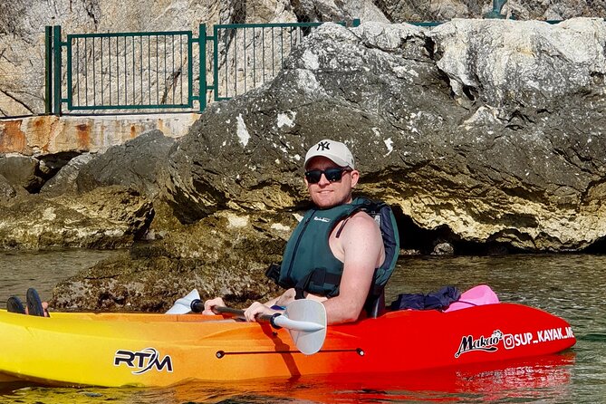 Budva Bay: Kayak & SUP Tour to Coastal Caves - Guides, equipment, and group pace