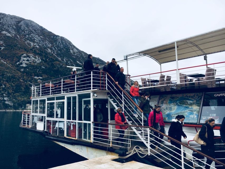 Dubrovnik: Montenegro Day Trip by Bus and Boat - Boarding the boat and entering the Bay of Kotor
