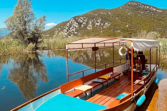 Explore Skadar Lake in Private 2 hour Boat Cruise - Leaving Virpazar through the plant-lined channel