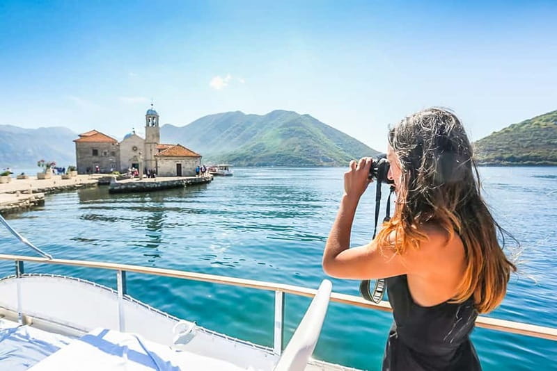 Kotor Bay: Full-Day Catamaran Cruise with Blue Cave Visit - Our Lady of the Rocks adds meaning to the scenery