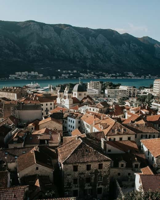 Kotor: Budva and Sveti Stefan Guided Shore Excursion - Leaving Kotor with the bay below you
