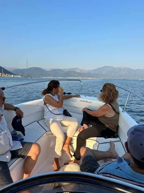 Kotor: Our Lady of the Rocks and Blue Cave Group Boat Tour - Entering the Blue Cave by boat
