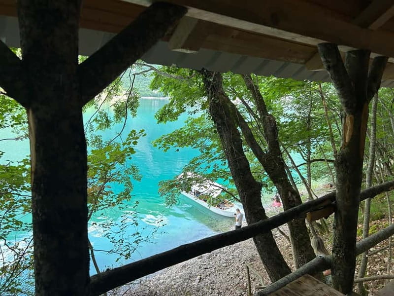 Piva Lake: Oteša Cave Cruise with Optional BBQ - Passing the bridge on Piva Lake