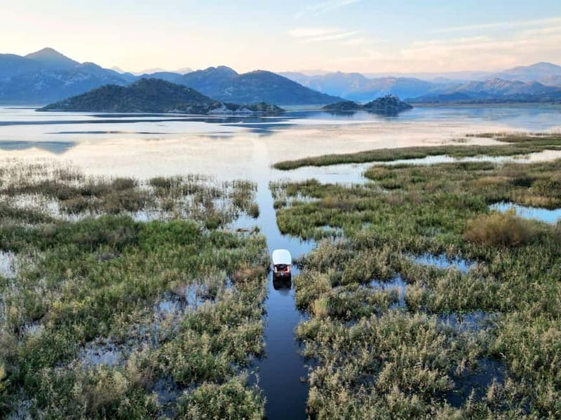 Skadar Lake: Guided Sunset Boat Tour with Wooden Boat & Wine - A gentle start from Virpazar