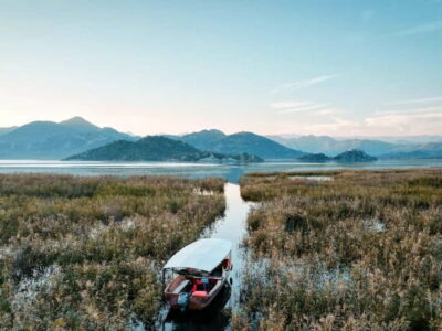 Skadar Lake: Guided Sunset Boat Tour with Wooden Boat & Wine