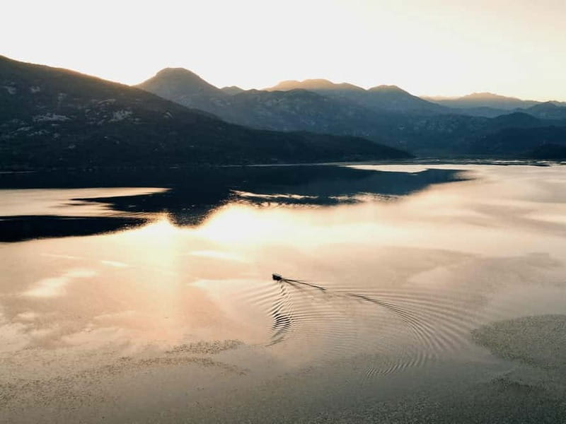 Skadar Lake: Guided Sunset Boat Tour with Wooden Boat & Wine - What the $26 price really buys