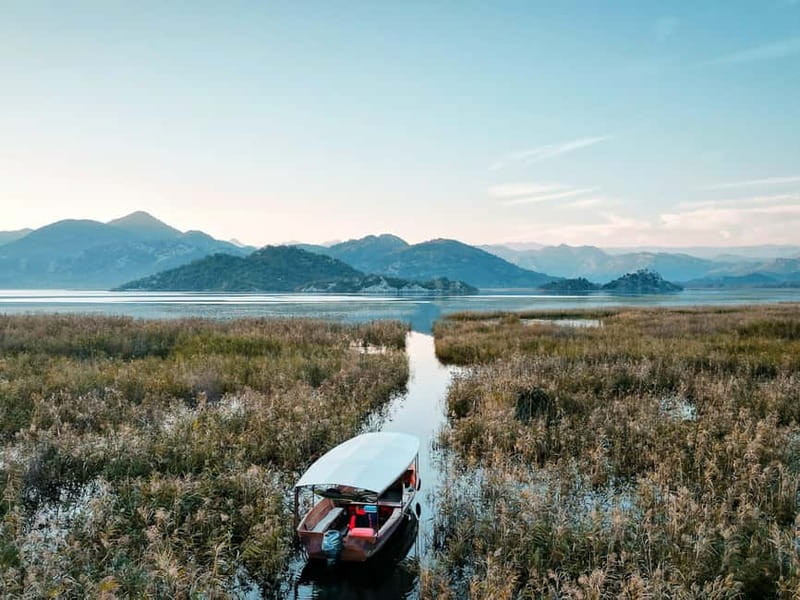 Skadar Lake: Guided Sunset Boat Tour with Wooden Boat & Wine - Why the traditional wooden boat suits the lake