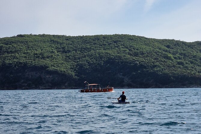 Small group kayaking tour from Budva to Sveti Nikola island caves - Sveti Nikola island, caves, and open-water views