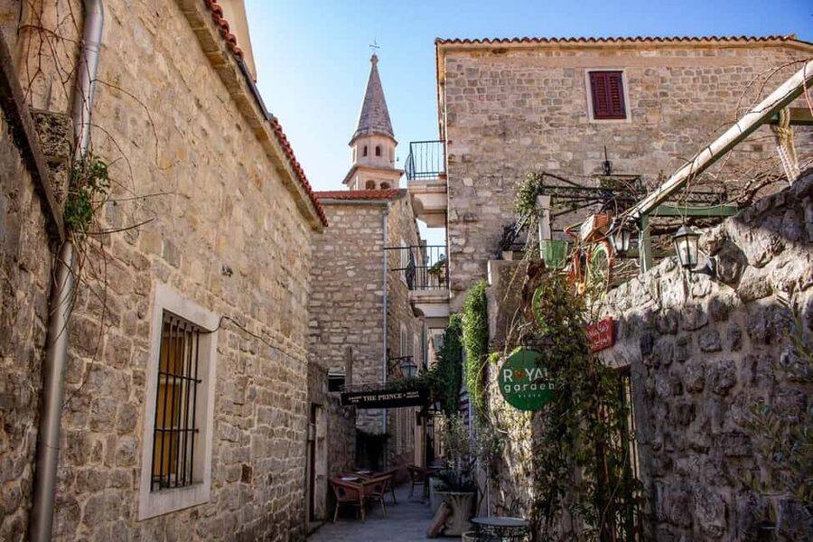 Tirana/Durres/Shkoder: Montenegro Day Tour Budva & S. Stefan - Mogren Beach offers a choice between sand and more sightseeing